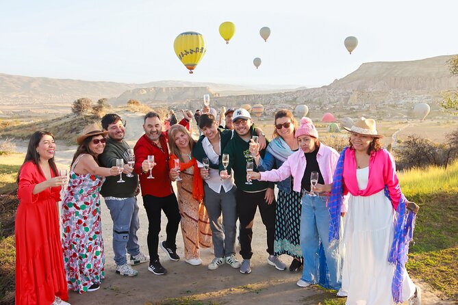 Balloons watching Tour w/ PickUp, Breakfast - Love Valley at sunrise, with fairy chimneys below the balloons