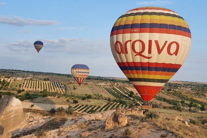 Cappadocia Sunrise Hot Air Balloon Ride | All-Inclusive Tour Cat - Watching the balloon come alive in Çat Vadisi