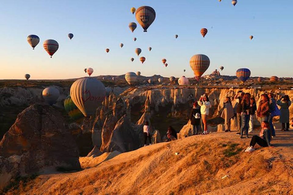 Cappadocia: Sunrise Hot Air Balloon Watching Tour - Watching the balloons inflate before sunrise