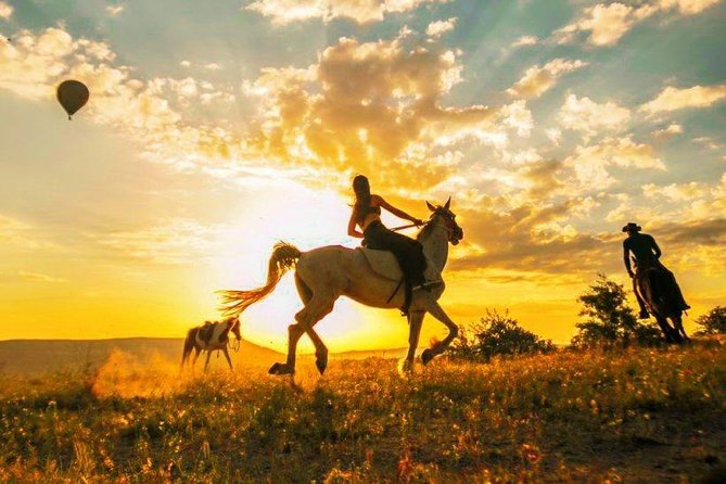 Horse Riding in Cappadocia in fairy chimeys - Rose Valley in changing light